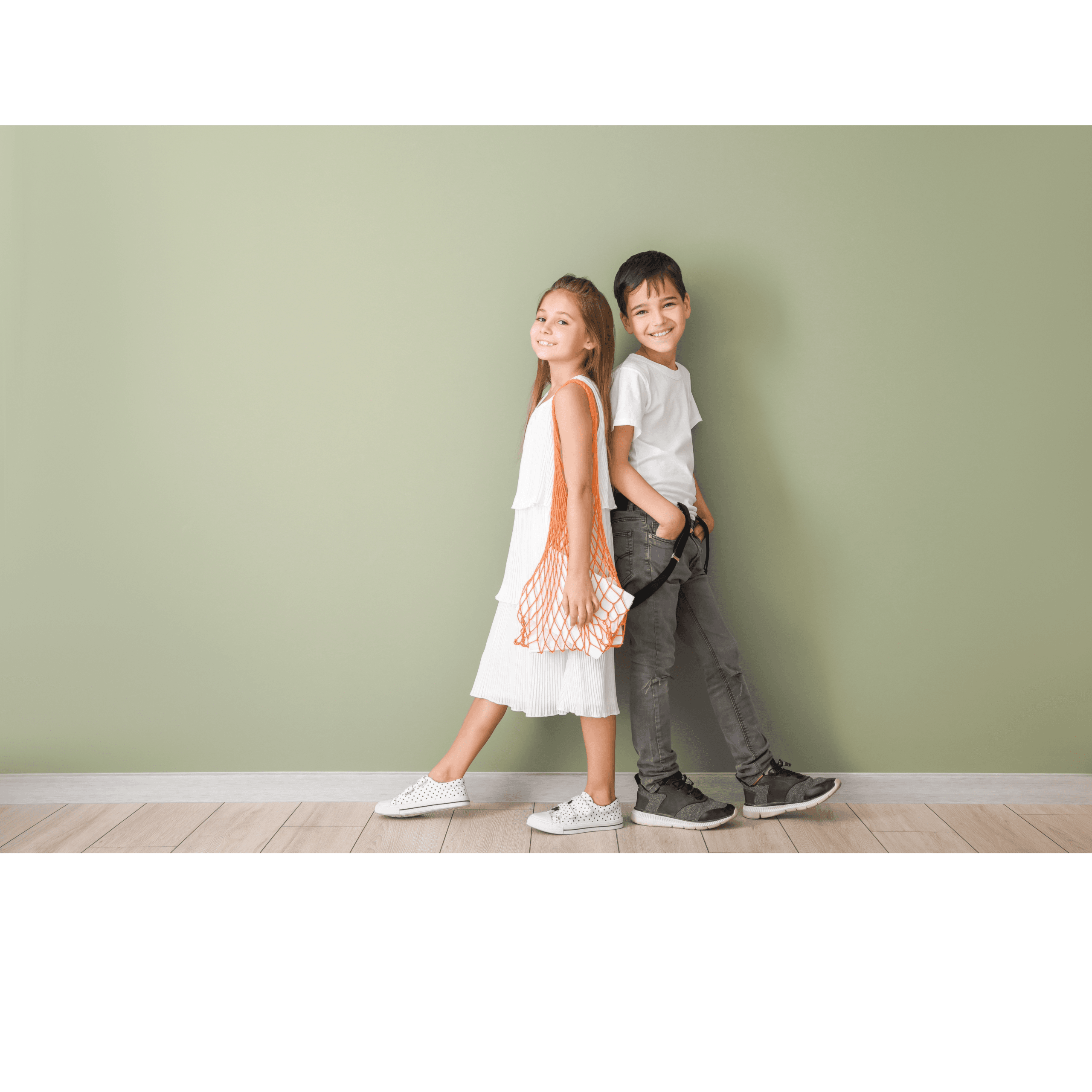 Girl and boy posing together in casual outfits