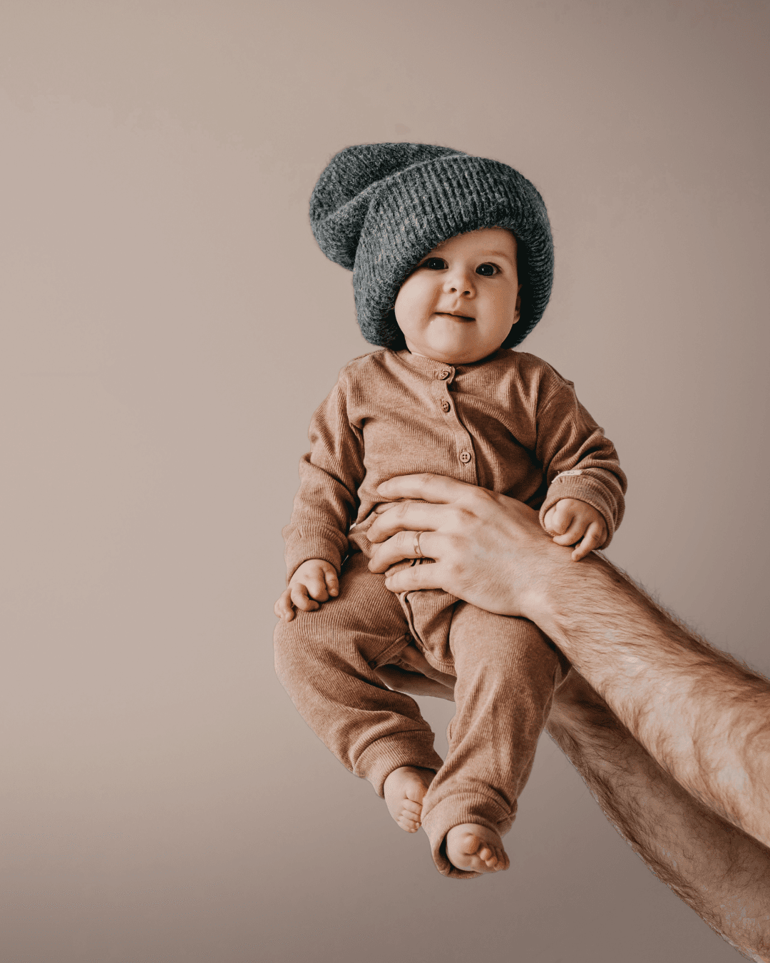 Baby wearing a soft blue outfit